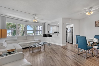 Enjoy waterfront living with wide water views from this freshly on North Palm Beach Country Club in Florida - for sale on GolfHomes.com, golf home, golf lot