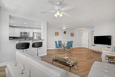 Enjoy waterfront living with wide water views from this freshly on North Palm Beach Country Club in Florida - for sale on GolfHomes.com, golf home, golf lot