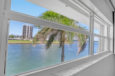 Enjoy waterfront living with wide water views from this freshly on North Palm Beach Country Club in Florida - for sale on GolfHomes.com, golf home, golf lot