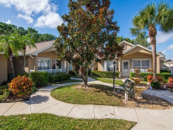 Lovely large end unit villa in the Isle of Venice at Kings Isle on Nicholas Golf Club in Florida - for sale on GolfHomes.com, golf home, golf lot