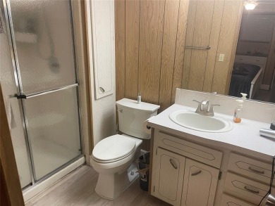 Absolutely beautiful 2/2 double wide on one of the best views of on Davie Golf Club in Florida - for sale on GolfHomes.com, golf home, golf lot
