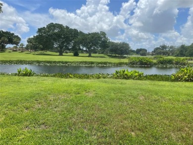 Absolutely beautiful 2/2 double wide on one of the best views of on Davie Golf Club in Florida - for sale on GolfHomes.com, golf home, golf lot