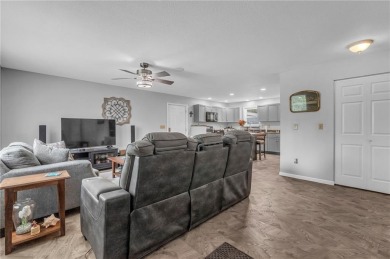Welcome to your meticulously crafted retreat in the serene on Linn Valley Lakes - Deer Trace Golf Course in Kansas - for sale on GolfHomes.com, golf home, golf lot