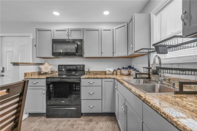 Welcome to your meticulously crafted retreat in the serene on Linn Valley Lakes - Deer Trace Golf Course in Kansas - for sale on GolfHomes.com, golf home, golf lot