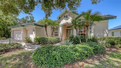 This beautiful custom built home set behind the gates of on Palm Aire Country Club of Sarasota in Florida - for sale on GolfHomes.com, golf home, golf lot