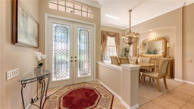 This beautiful custom built home set behind the gates of on Palm Aire Country Club of Sarasota in Florida - for sale on GolfHomes.com, golf home, golf lot