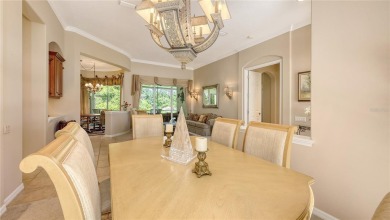 This beautiful custom built home set behind the gates of on Palm Aire Country Club of Sarasota in Florida - for sale on GolfHomes.com, golf home, golf lot