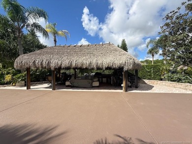 Exceptional Lot with Banyan Tree and Lake Views - Move-In Ready! on St. Lucie Trail Golf Club in Florida - for sale on GolfHomes.com, golf home, golf lot