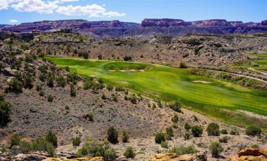 Nestled on the edge of a dramatic cliff, this exceptional on The Golf Club At Redlands Mesa in Colorado - for sale on GolfHomes.com, golf home, golf lot