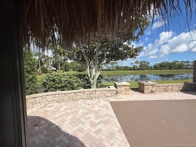 Exceptional Lot with Banyan Tree and Lake Views - Move-In Ready! on St. Lucie Trail Golf Club in Florida - for sale on GolfHomes.com, golf home, golf lot