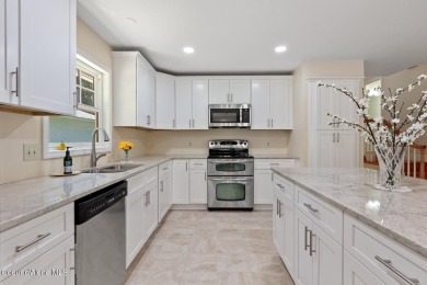 This beautifully updated 4 bed / 3 bath home sits on a spacious on Hayden Lake Country Club in Idaho - for sale on GolfHomes.com, golf home, golf lot