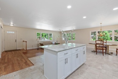 This beautifully updated 4 bed / 3 bath home sits on a spacious on Hayden Lake Country Club in Idaho - for sale on GolfHomes.com, golf home, golf lot