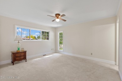 This beautifully updated 4 bed / 3 bath home sits on a spacious on Hayden Lake Country Club in Idaho - for sale on GolfHomes.com, golf home, golf lot