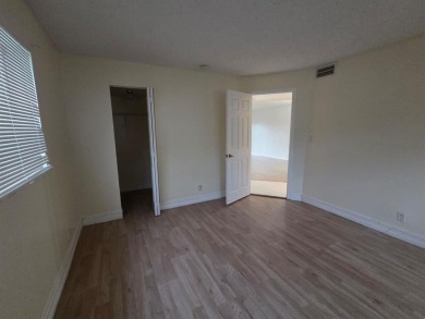Bright & Spacious Corner Unit with Water Views-Investor on Colony West Country Club in Florida - for sale on GolfHomes.com, golf home, golf lot