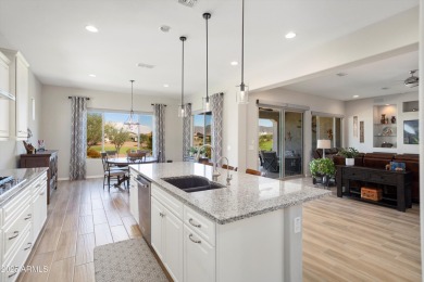 Stunning Endeavor model on the 6th hole of Sun City Festival's on Copper Canyon Golf Club in Arizona - for sale on GolfHomes.com, golf home, golf lot