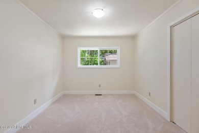 This beautifully updated 4 bed / 3 bath home sits on a spacious on Hayden Lake Country Club in Idaho - for sale on GolfHomes.com, golf home, golf lot