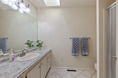 This beautifully updated 4 bed / 3 bath home sits on a spacious on Hayden Lake Country Club in Idaho - for sale on GolfHomes.com, golf home, golf lot