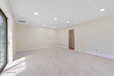 This beautifully updated 4 bed / 3 bath home sits on a spacious on Hayden Lake Country Club in Idaho - for sale on GolfHomes.com, golf home, golf lot