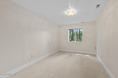 This beautifully updated 4 bed / 3 bath home sits on a spacious on Hayden Lake Country Club in Idaho - for sale on GolfHomes.com, golf home, golf lot