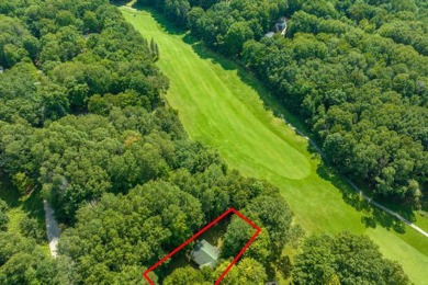 Discover the epitome of tranquility with this charming on Canadian Lakes Country Club-The Highlands Course in Michigan - for sale on GolfHomes.com, golf home, golf lot