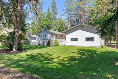 This beautifully updated 4 bed / 3 bath home sits on a spacious on Hayden Lake Country Club in Idaho - for sale on GolfHomes.com, golf home, golf lot