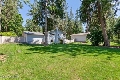 This beautifully updated 4 bed / 3 bath home sits on a spacious on Hayden Lake Country Club in Idaho - for sale on GolfHomes.com, golf home, golf lot