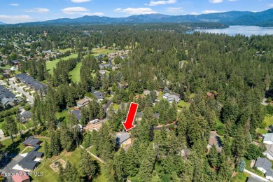 This beautifully updated 4 bed / 3 bath home sits on a spacious on Hayden Lake Country Club in Idaho - for sale on GolfHomes.com, golf home, golf lot