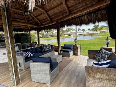 Prime Lakefront Lot with Golf Course Views - Fully Furnished! on Motorcoach Resort Golf Course in Florida - for sale on GolfHomes.com, golf home, golf lot