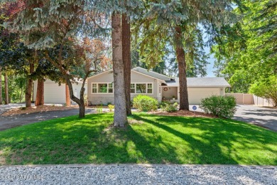 This beautifully updated 4 bed / 3 bath home sits on a spacious on Hayden Lake Country Club in Idaho - for sale on GolfHomes.com, golf home, golf lot