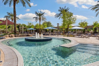 Stunning Endeavor model on the 6th hole of Sun City Festival's on Copper Canyon Golf Club in Arizona - for sale on GolfHomes.com, golf home, golf lot