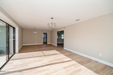 Step into this completely remodeled Washington model, nestled in on Indian River Colony Club in Florida - for sale on GolfHomes.com, golf home, golf lot