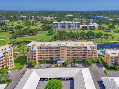 Enjoy spectacular sunrises AND sunsets from this luxury end unit on Pinebrook/Ironwood Golf Course in Florida - for sale on GolfHomes.com, golf home, golf lot