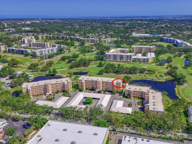 Enjoy spectacular sunrises AND sunsets from this luxury end unit on Pinebrook/Ironwood Golf Course in Florida - for sale on GolfHomes.com, golf home, golf lot