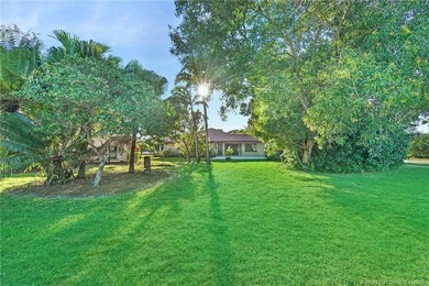 Gorgeous home on 1/4 acre corner lot in Martin Downs. 3 BR plus on Martin Downs Country Club in Florida - for sale on GolfHomes.com, golf home, golf lot