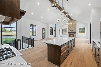 Discover elevated mountain living in this brand-new custom home on Teton Reserve in Idaho - for sale on GolfHomes.com, golf home, golf lot