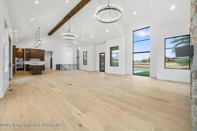 Discover elevated mountain living in this brand-new custom home on Teton Reserve in Idaho - for sale on GolfHomes.com, golf home, golf lot