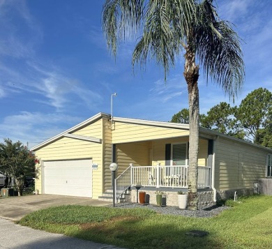 Rare Find! 2-Bedroom Palm Harbor Home with 2-Car Garage, Office on Schalamar Creek Golf and Country Club in Florida - for sale on GolfHomes.com, golf home, golf lot
