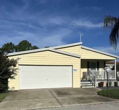 Rare Find! 2-Bedroom Palm Harbor Home with 2-Car Garage, Office on Schalamar Creek Golf and Country Club in Florida - for sale on GolfHomes.com, golf home, golf lot