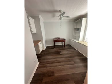 Rare Find! 2-Bedroom Palm Harbor Home with 2-Car Garage, Office on Schalamar Creek Golf and Country Club in Florida - for sale on GolfHomes.com, golf home, golf lot