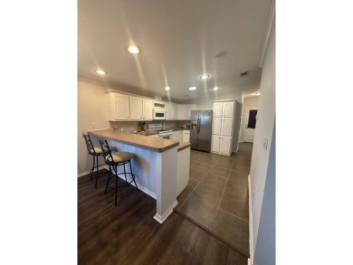 Rare Find! 2-Bedroom Palm Harbor Home with 2-Car Garage, Office on Schalamar Creek Golf and Country Club in Florida - for sale on GolfHomes.com, golf home, golf lot