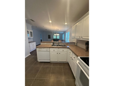 Rare Find! 2-Bedroom Palm Harbor Home with 2-Car Garage, Office on Schalamar Creek Golf and Country Club in Florida - for sale on GolfHomes.com, golf home, golf lot