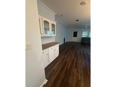 Rare Find! 2-Bedroom Palm Harbor Home with 2-Car Garage, Office on Schalamar Creek Golf and Country Club in Florida - for sale on GolfHomes.com, golf home, golf lot
