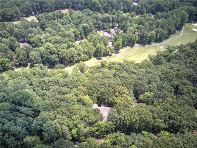 Nestled along the 5th fairway of the scenic Bent Tree golf on Bent Tree Golf Course in Georgia - for sale on GolfHomes.com, golf home, golf lot