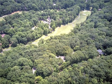 Nestled along the 5th fairway of the scenic Bent Tree golf on Bent Tree Golf Course in Georgia - for sale on GolfHomes.com, golf home, golf lot