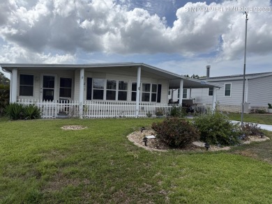 Welcome to this beautifully updated 2-bedroom, 2-bathroom home on High Point Golf Club, Inc. in Florida - for sale on GolfHomes.com, golf home, golf lot