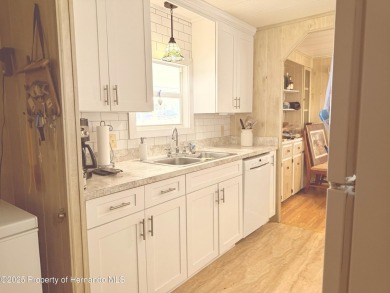 Welcome to this beautifully updated 2-bedroom, 2-bathroom home on High Point Golf Club, Inc. in Florida - for sale on GolfHomes.com, golf home, golf lot
