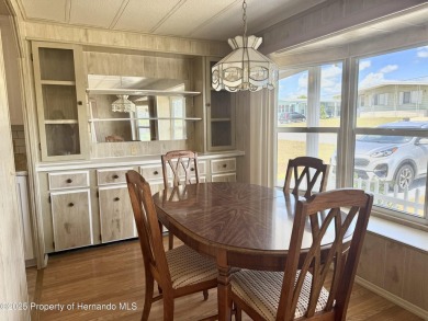 Welcome to this beautifully updated 2-bedroom, 2-bathroom home on High Point Golf Club, Inc. in Florida - for sale on GolfHomes.com, golf home, golf lot