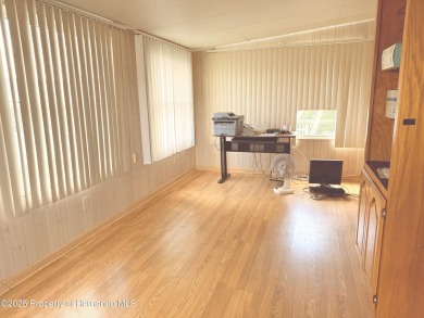 Welcome to this beautifully updated 2-bedroom, 2-bathroom home on High Point Golf Club, Inc. in Florida - for sale on GolfHomes.com, golf home, golf lot