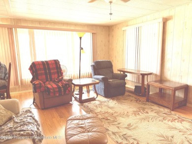 Welcome to this beautifully updated 2-bedroom, 2-bathroom home on High Point Golf Club, Inc. in Florida - for sale on GolfHomes.com, golf home, golf lot