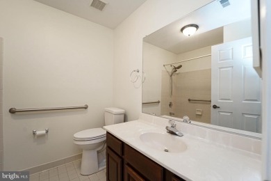 This charming brick and siding single-family home offers the on Heritage Harbour Golf Club in Maryland - for sale on GolfHomes.com, golf home, golf lot